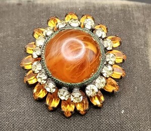Baltic amber cabochon brooch with gold filigree authenticated by gemologist
