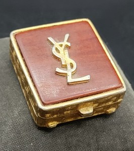 YSL gold compact luxury accessory
