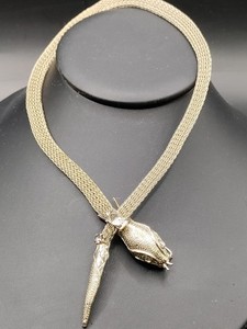 Gold tone mesh necklace with Buddha