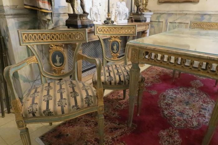 Gilt antique seating in a packed DePaul-area home