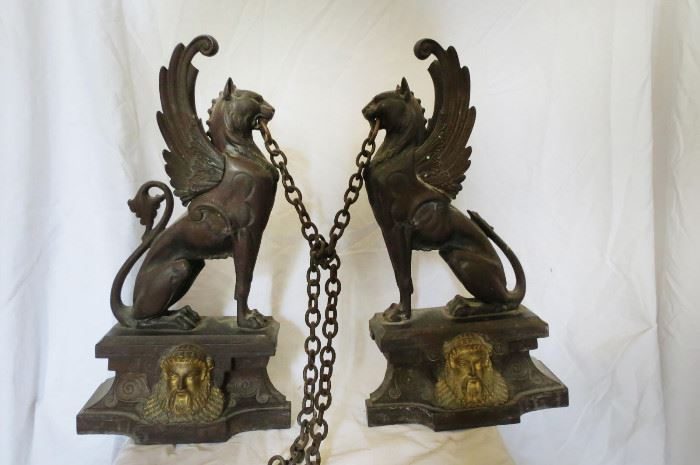 Pair of cast-iron winged-lion fireplace chenets