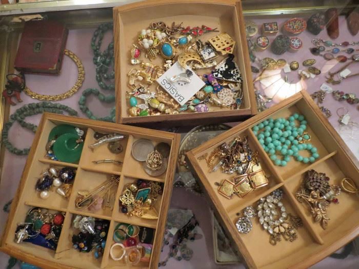 Boxes of sorted costume jewelry